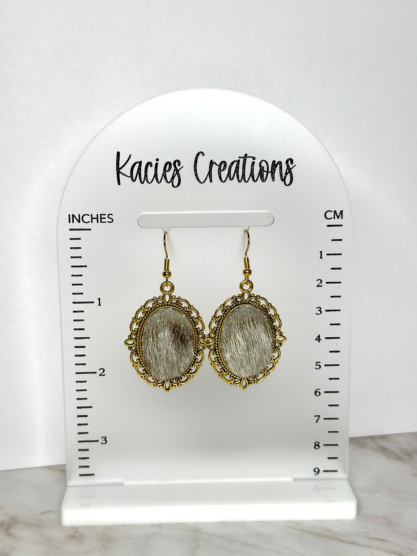 Seal skin gold earrings