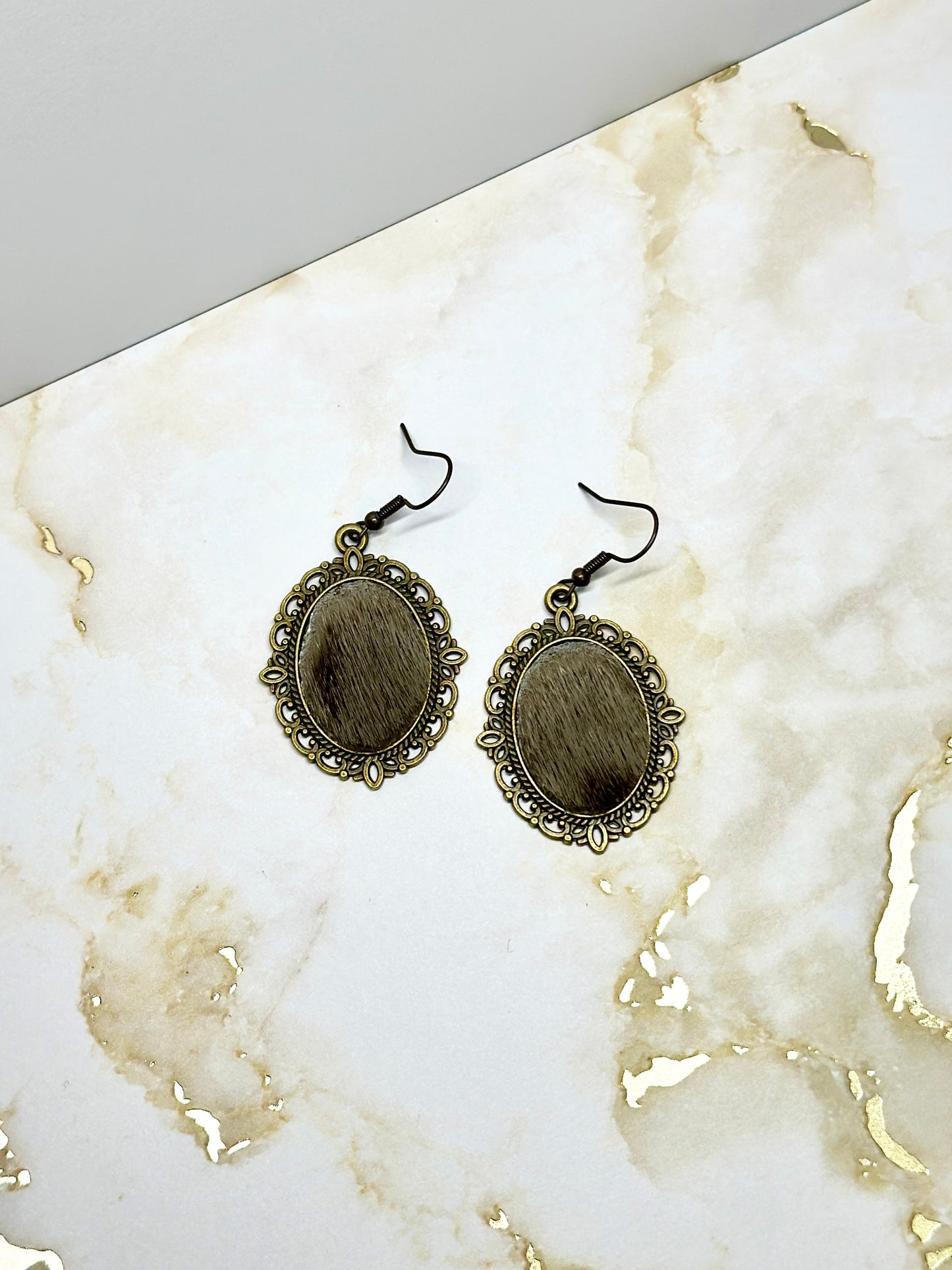 Seal skin pendant earrings