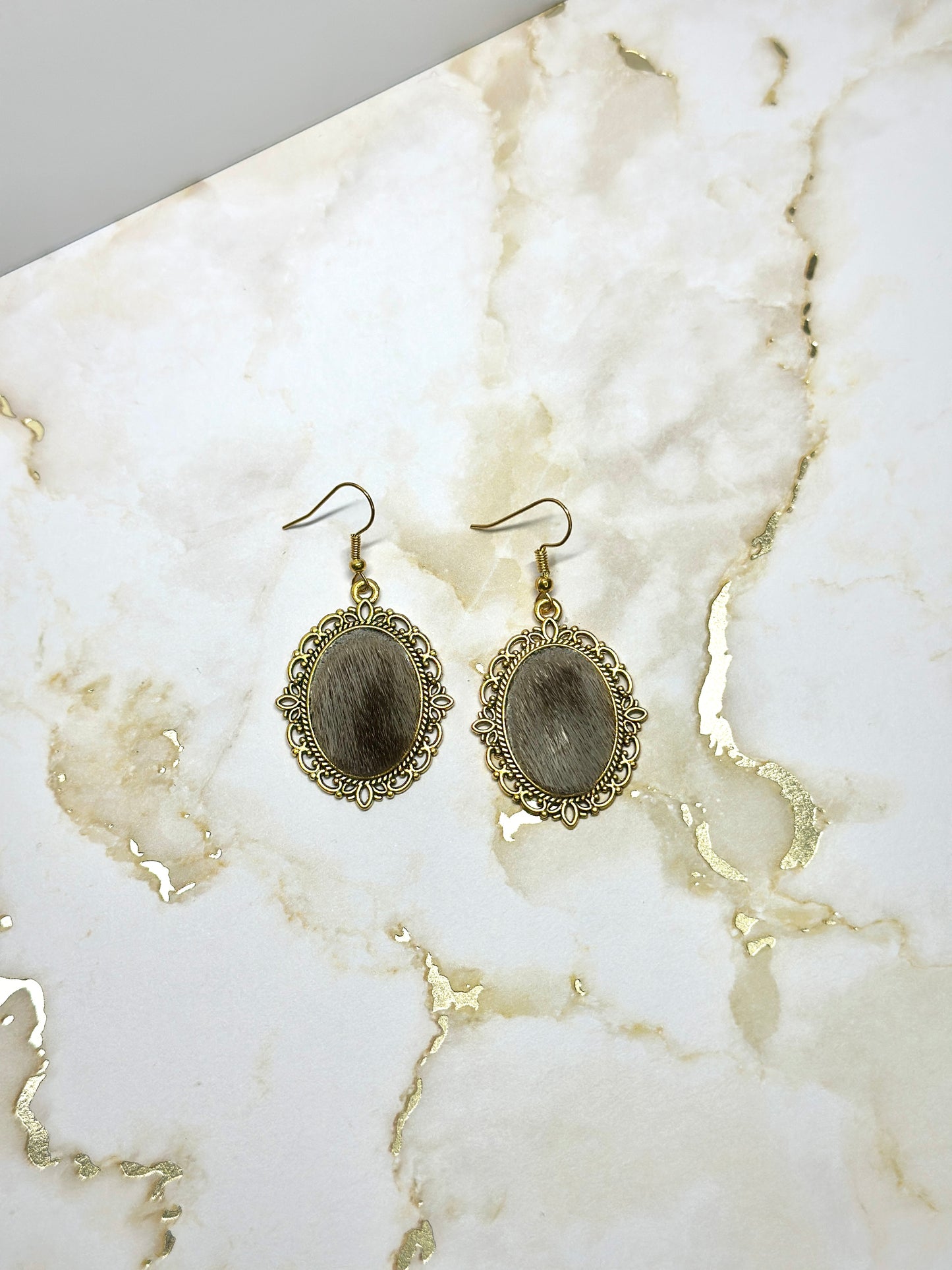 Seal skin pendant earrings
