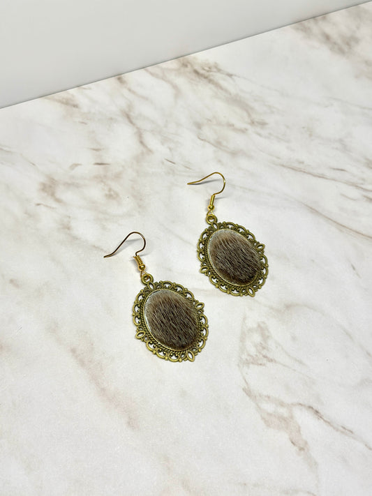 Seal skin brass earrings